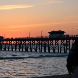 View of Avalon Fishing Pier with police presence in the background