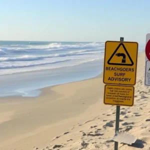 Dangerous surf conditions at Outer Banks beach during high surf advisory.