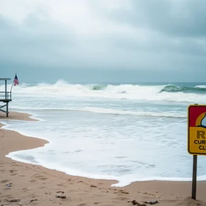 Warnings at a beach in the Outer Banks due to high rip current risk