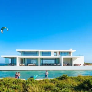 Modern waterfront property on Hatteras Island with kiteboarding activities