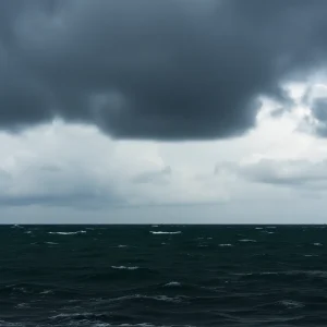 An intense hurricane scene over the ocean as storm clouds gather