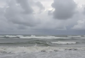 Coastal storm affecting the Outer Banks with strong winds and waves.